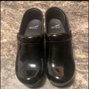 Brand new, black Dansko clogs. No longer have the box, never been worn outside.